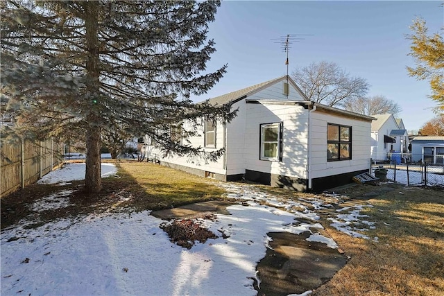 view of snow covered property