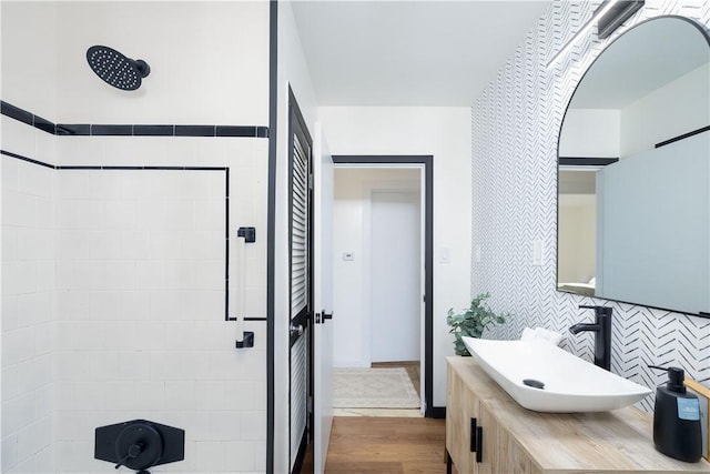 bathroom with sink and hardwood / wood-style floors