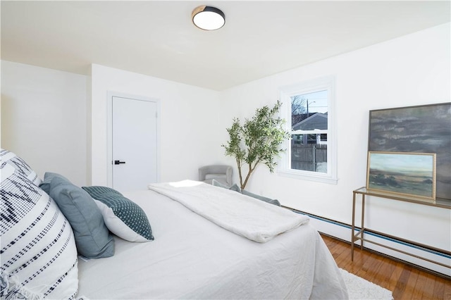 bedroom with wood-type flooring