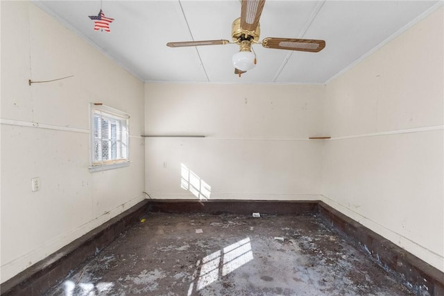 empty room with crown molding and ceiling fan