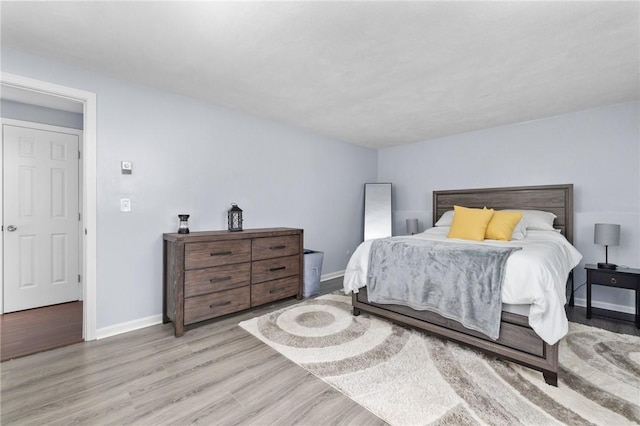 bedroom featuring light hardwood / wood-style flooring