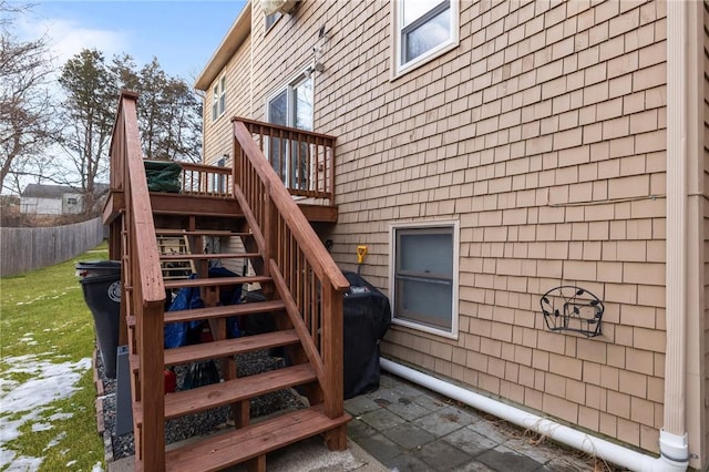 view of property exterior featuring a deck