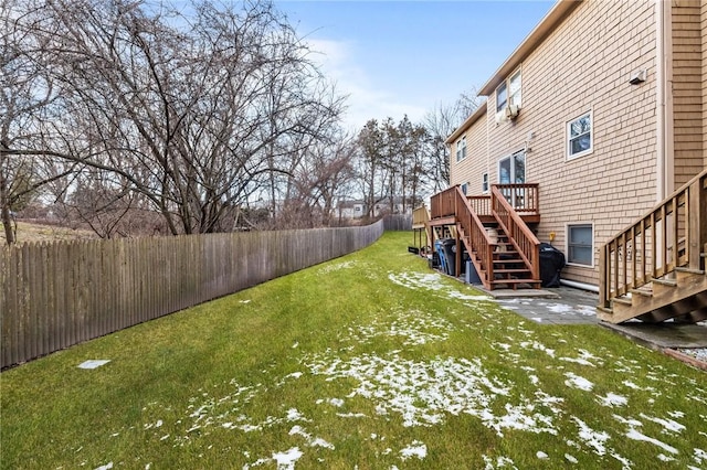 view of yard featuring a wooden deck