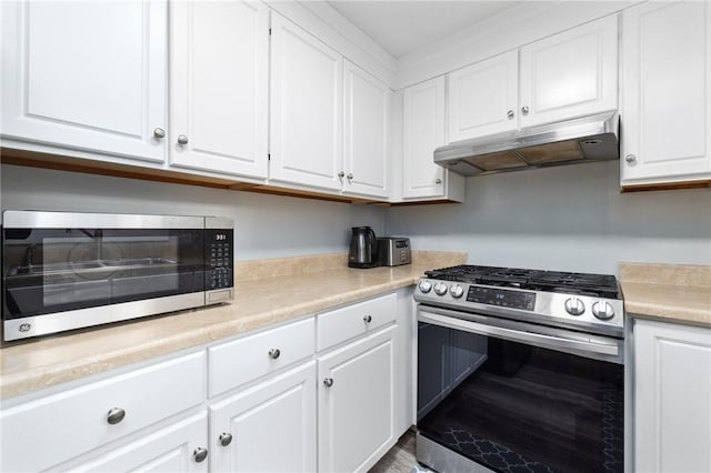 kitchen with white cabinetry and stainless steel range with gas stovetop