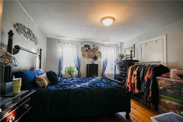 bedroom with light hardwood / wood-style flooring