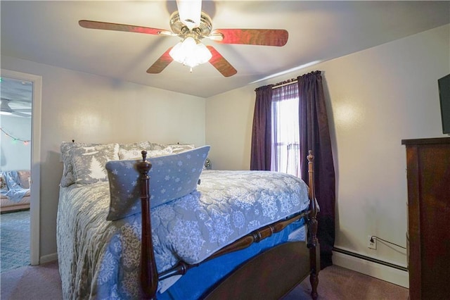 carpeted bedroom with ceiling fan and baseboard heating