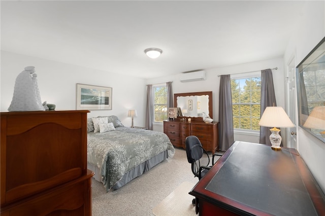 carpeted bedroom featuring multiple windows and an AC wall unit