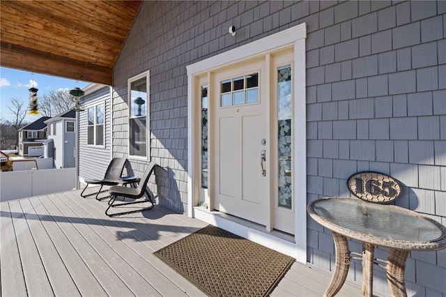 property entrance featuring a porch