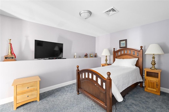 carpeted bedroom with baseboards and visible vents