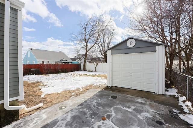 view of snow covered garage