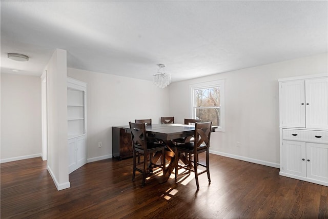 dining area with a notable chandelier and dark wood-type flooring