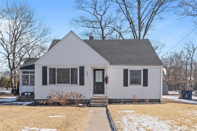 bungalow with a front lawn