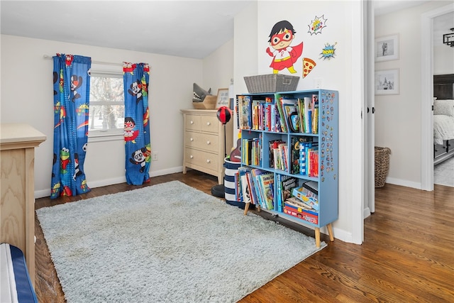 bedroom featuring dark wood-type flooring