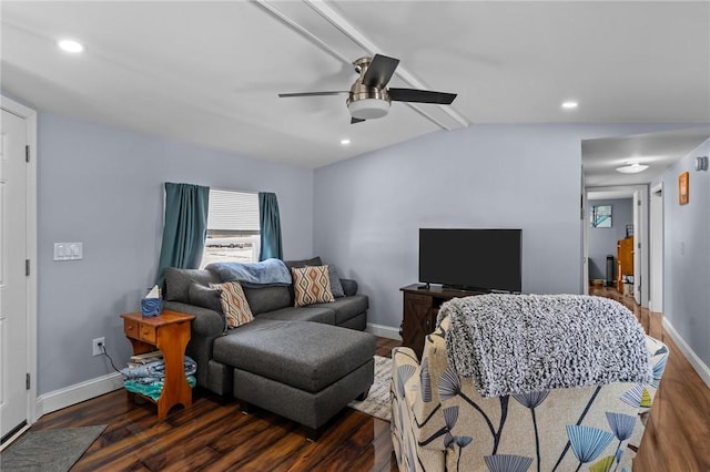 living room featuring dark wood-type flooring, lofted ceiling with beams, and ceiling fan