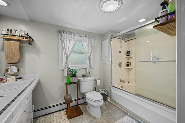 full bathroom featuring shower / bath combination with glass door, tile patterned flooring, vanity, a baseboard heating unit, and toilet