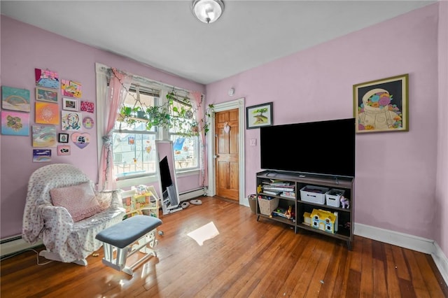 interior space featuring hardwood / wood-style floors and a baseboard radiator