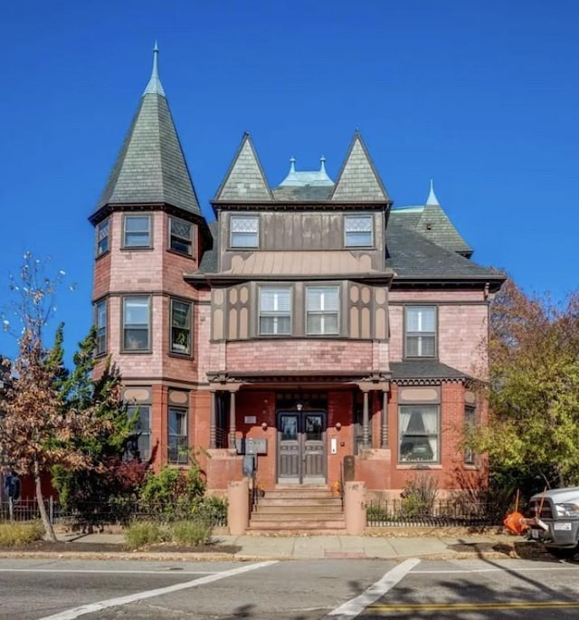 victorian home featuring french doors