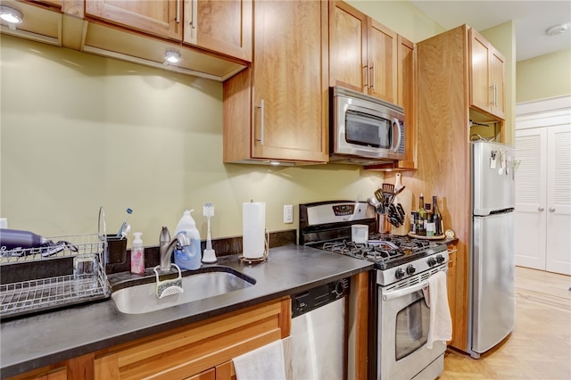 kitchen with stainless steel appliances and sink