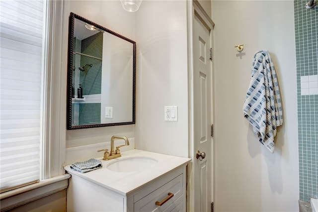 bathroom featuring vanity and walk in shower