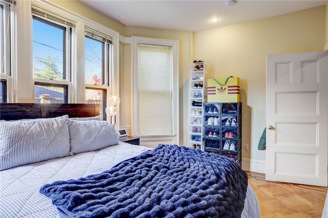 bedroom featuring parquet floors