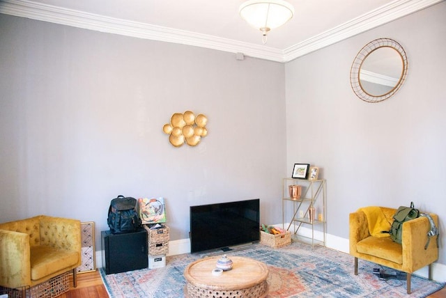 living room with ornamental molding and wood-type flooring