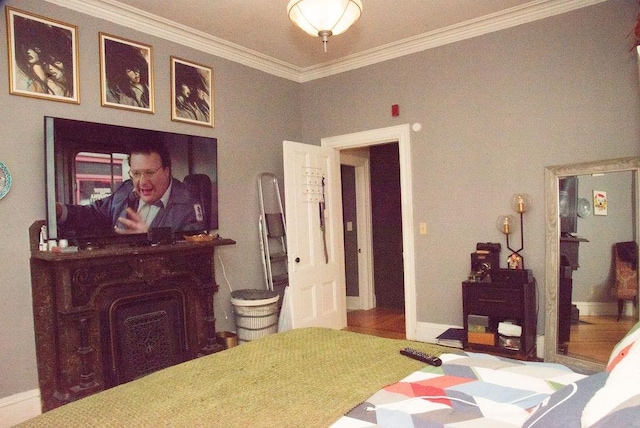 bedroom featuring crown molding