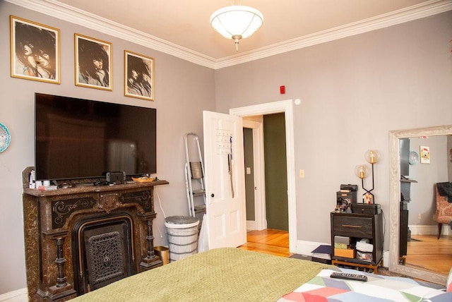 interior space featuring crown molding and hardwood / wood-style flooring