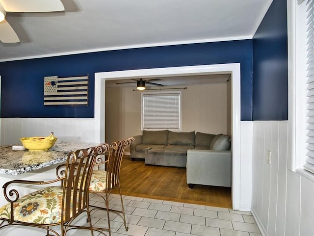 dining space featuring hardwood / wood-style floors and ceiling fan