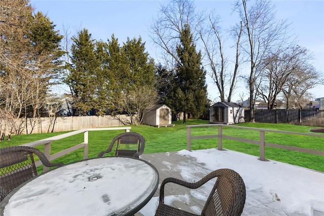 view of patio / terrace with a shed