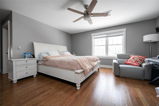 bedroom with dark wood-type flooring and ceiling fan