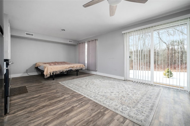 bedroom featuring ceiling fan and hardwood / wood-style floors