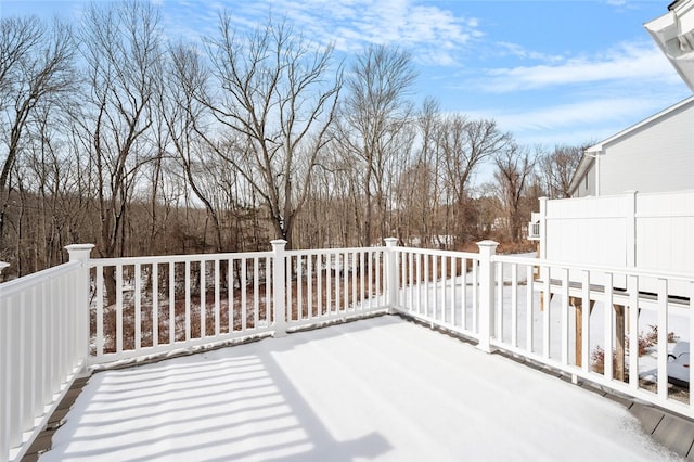 view of snow covered deck