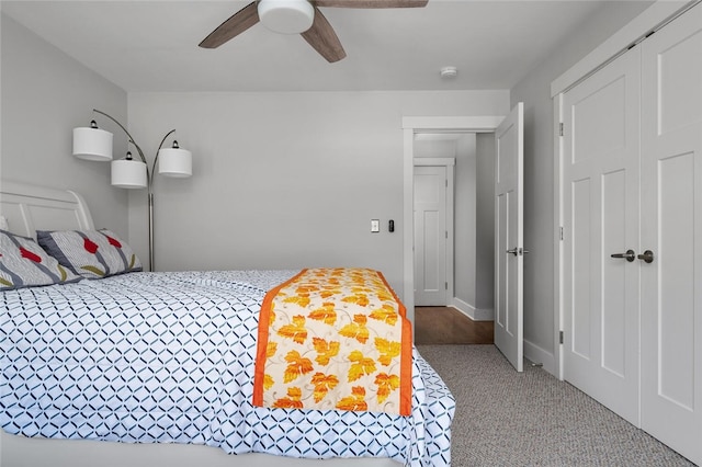 carpeted bedroom with ceiling fan