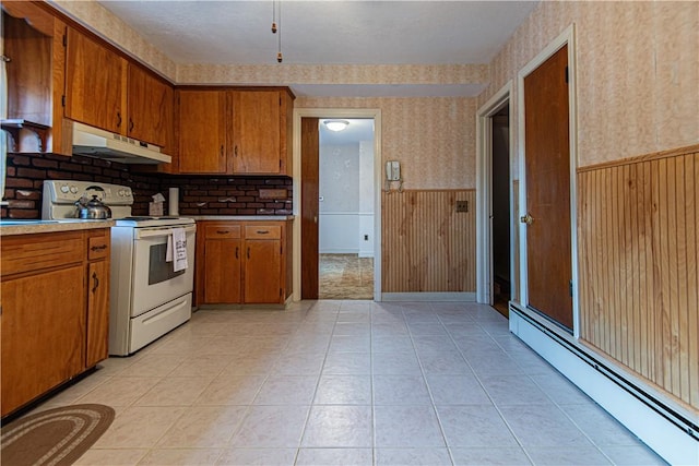 kitchen featuring a baseboard radiator, light tile patterned flooring, and white electric range oven