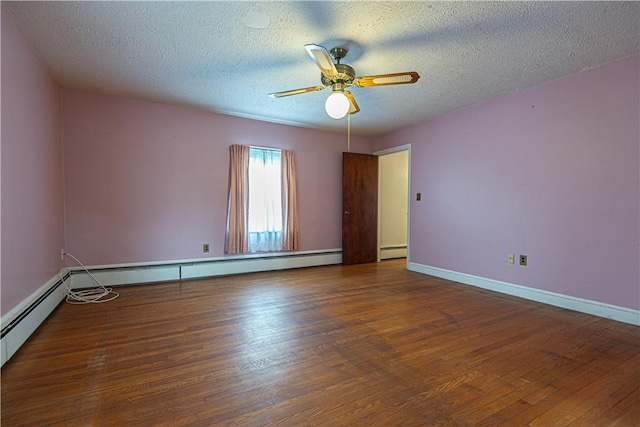 empty room featuring dark wood-type flooring, ceiling fan, and a textured ceiling