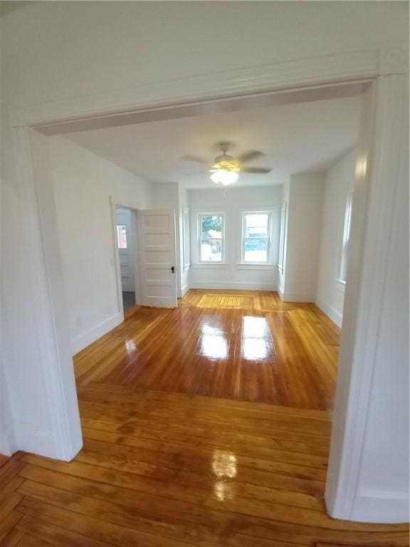 interior space featuring hardwood / wood-style flooring and ceiling fan