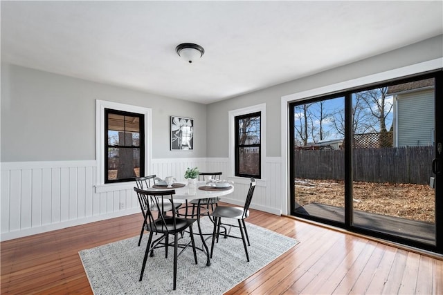 dining space featuring hardwood / wood-style flooring