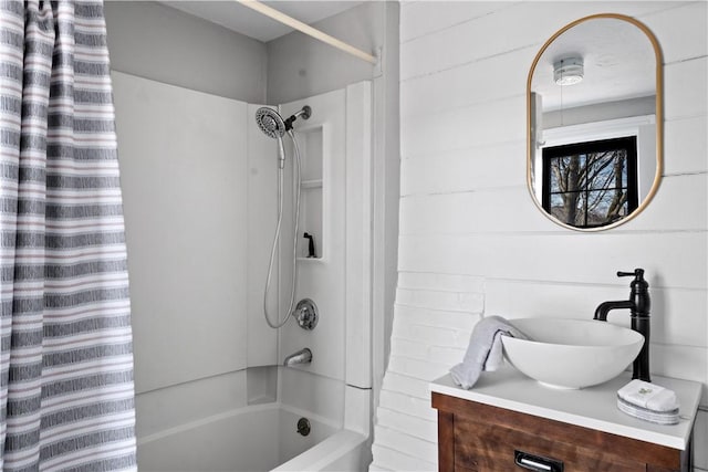 bathroom with shower / tub combo with curtain and vanity