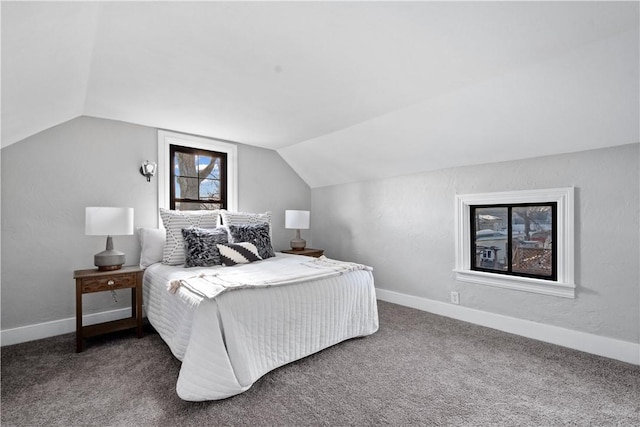 carpeted bedroom featuring lofted ceiling