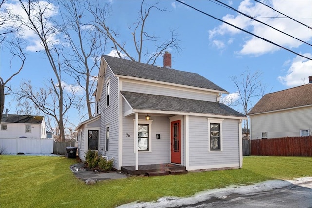 bungalow-style house featuring a front yard