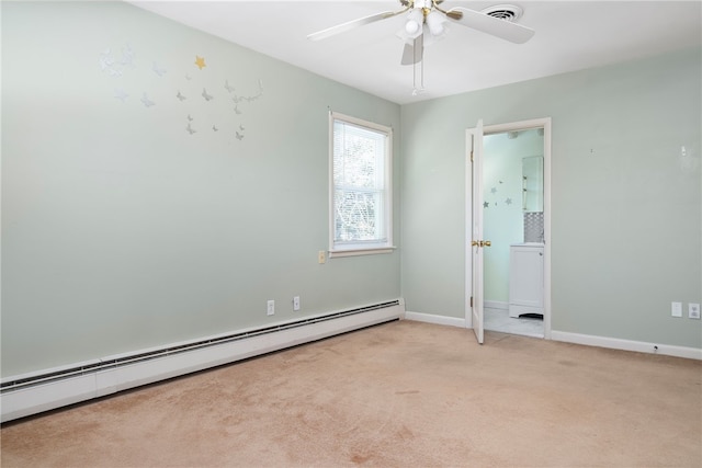 carpeted spare room featuring ceiling fan and a baseboard radiator