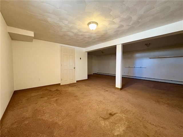 interior space featuring carpet, a textured ceiling, and a baseboard radiator