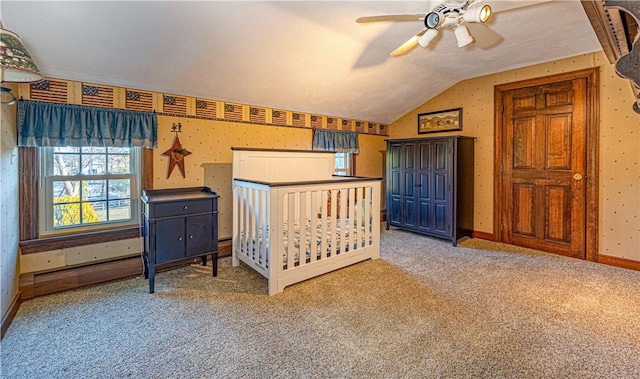 carpeted bedroom with ceiling fan and lofted ceiling