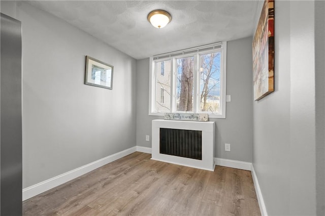 empty room with light wood-type flooring