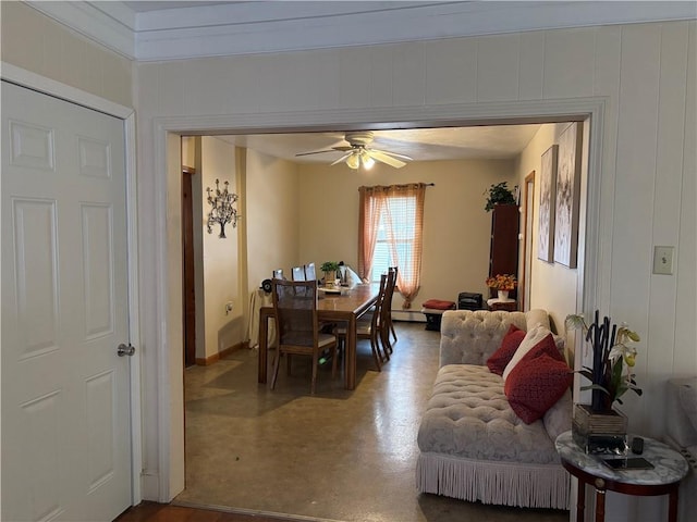 dining space featuring baseboard heating, ceiling fan, and concrete flooring