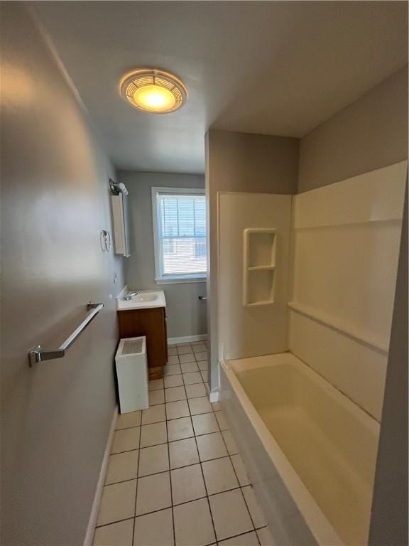 6 David St, East Providence, RI 02916 - bathroom featuring tile patterned floors, baseboards, vanity, and  shower combination