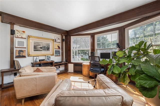 interior space featuring hardwood / wood-style flooring and radiator