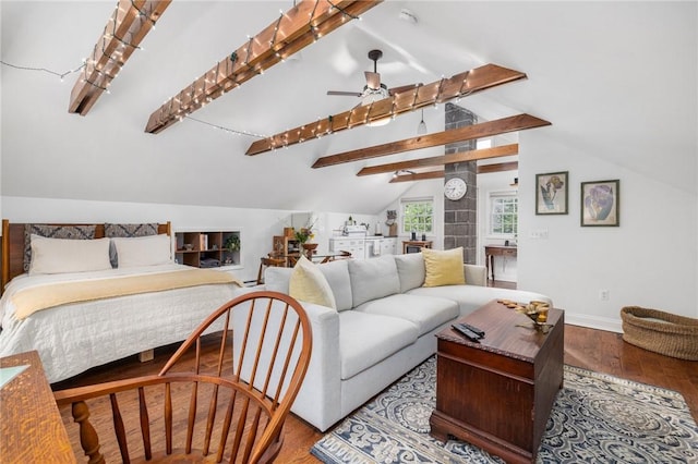 bedroom with hardwood / wood-style floors and vaulted ceiling with beams