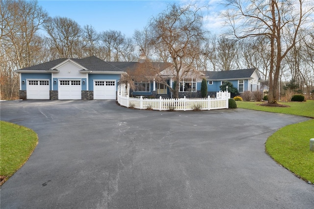 single story home with a garage