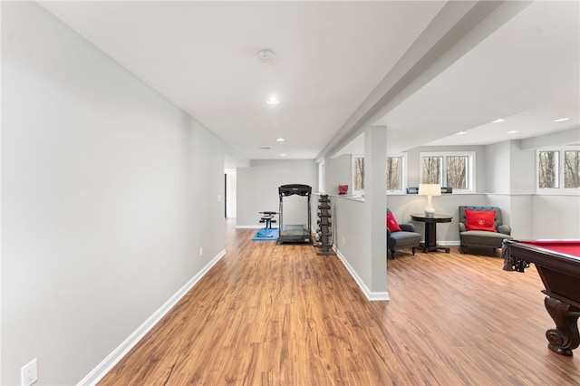 workout area featuring billiards and light hardwood / wood-style flooring